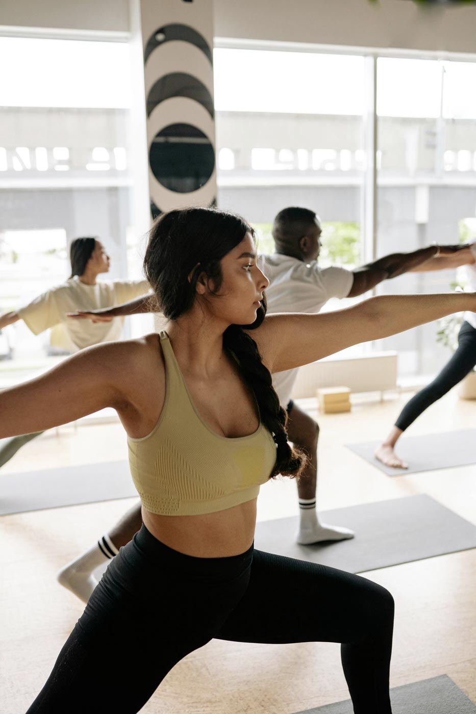 postpartum surrogate mother doing yoga